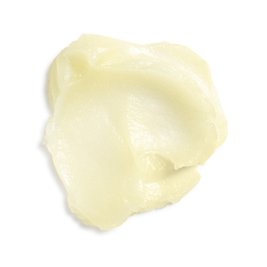 Eminence Organics Yuzu Solid Body Oil — texture swatch applied to skin