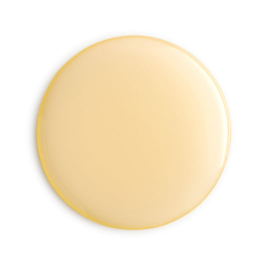 Eminence Organics Apricot Body Oil — texture swatch applied to skin