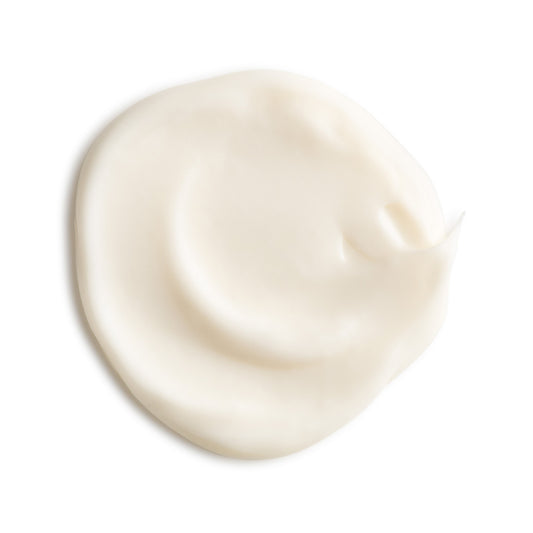 Eminence Organics Coconut Firming Body Lotion — texture swatch applied to skin