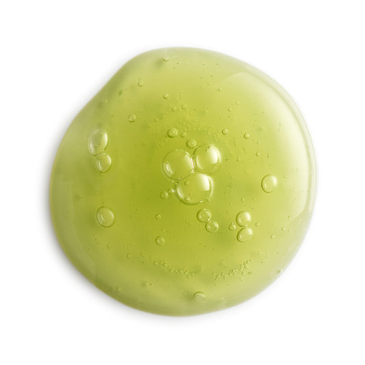 Eminence Organics Stone Crop Serum — texture swatch applied to skin